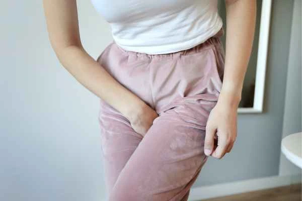 older woman running to the toilet because of urinary incontinence Chippenham